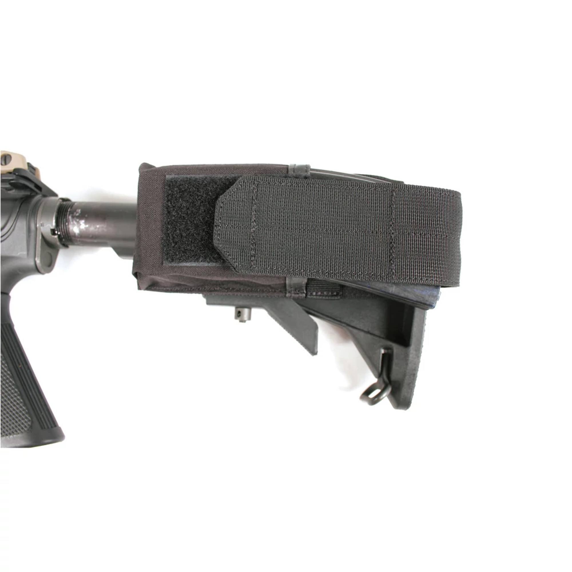 Buttstock magazine outlet pouch